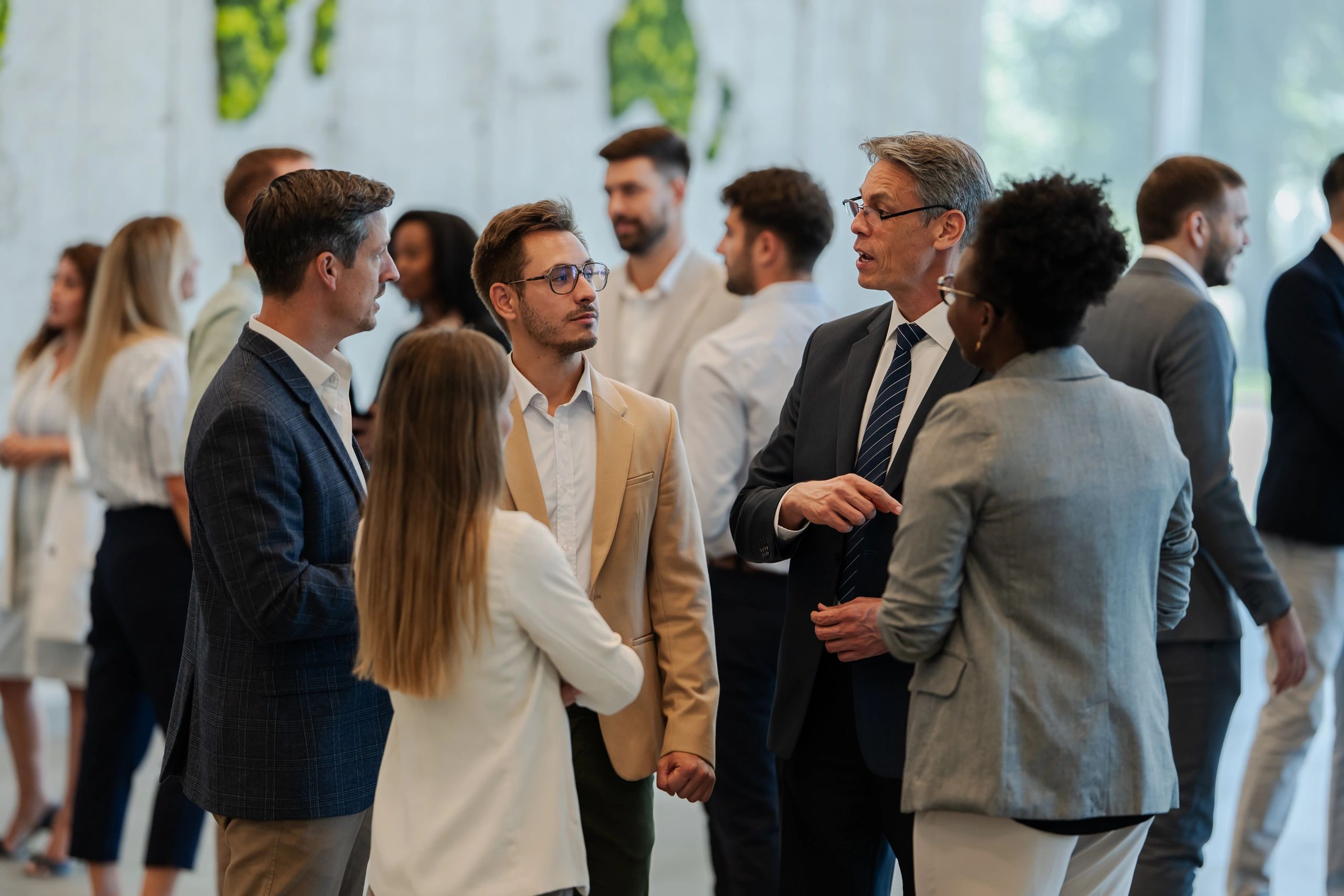 Professionals discussing during a policy-focused conference
